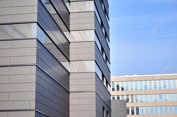 modern-office-building-with-white-metallic-panel-facade-windows_991208-14112.jpg